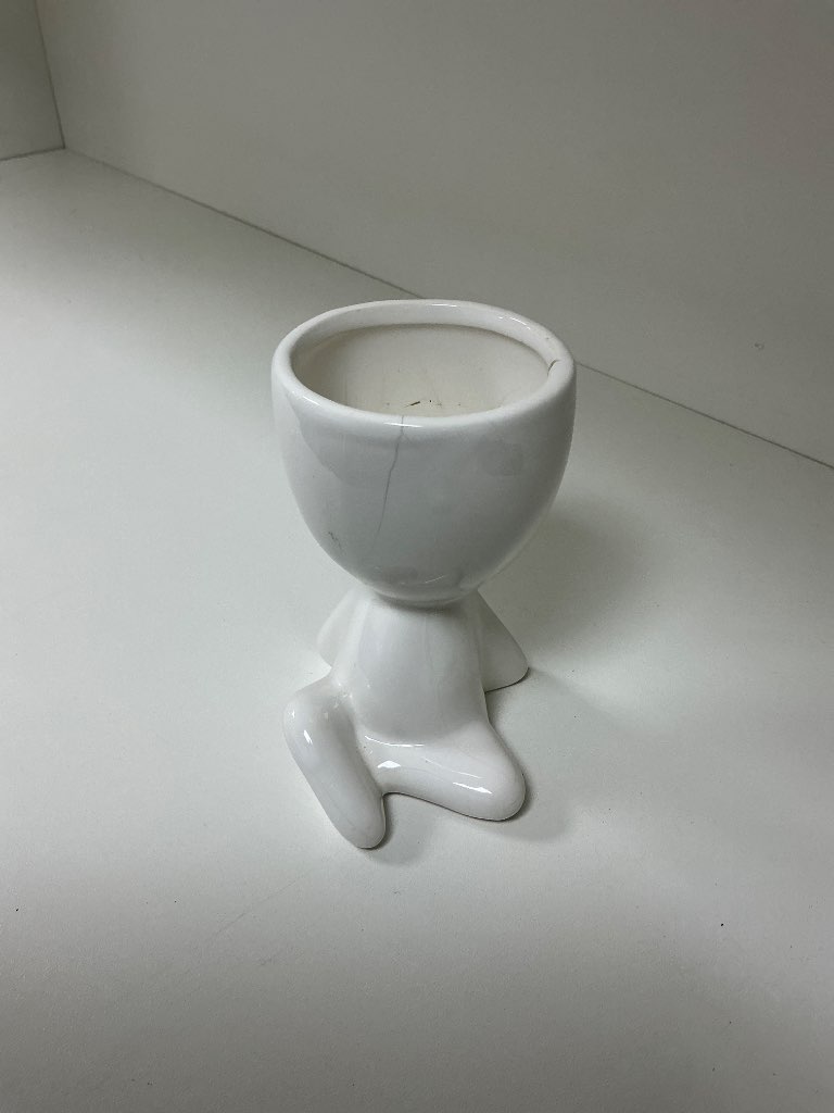 VASO BONECO SENTADO